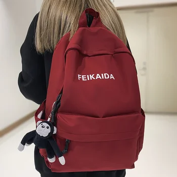 Moda Erkek Bayanlar Su Geçirmez Kırmızı Seyahat Serin Sırt Çantası Kadın Erkek kolej çantası Kız Erkek Naylon okul çantası Kadın Sırt Çantaları Moda